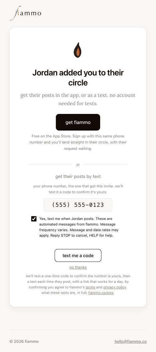 The same page with a phone number filled in and the consent checkbox ticked, which enables the Text me a code button.